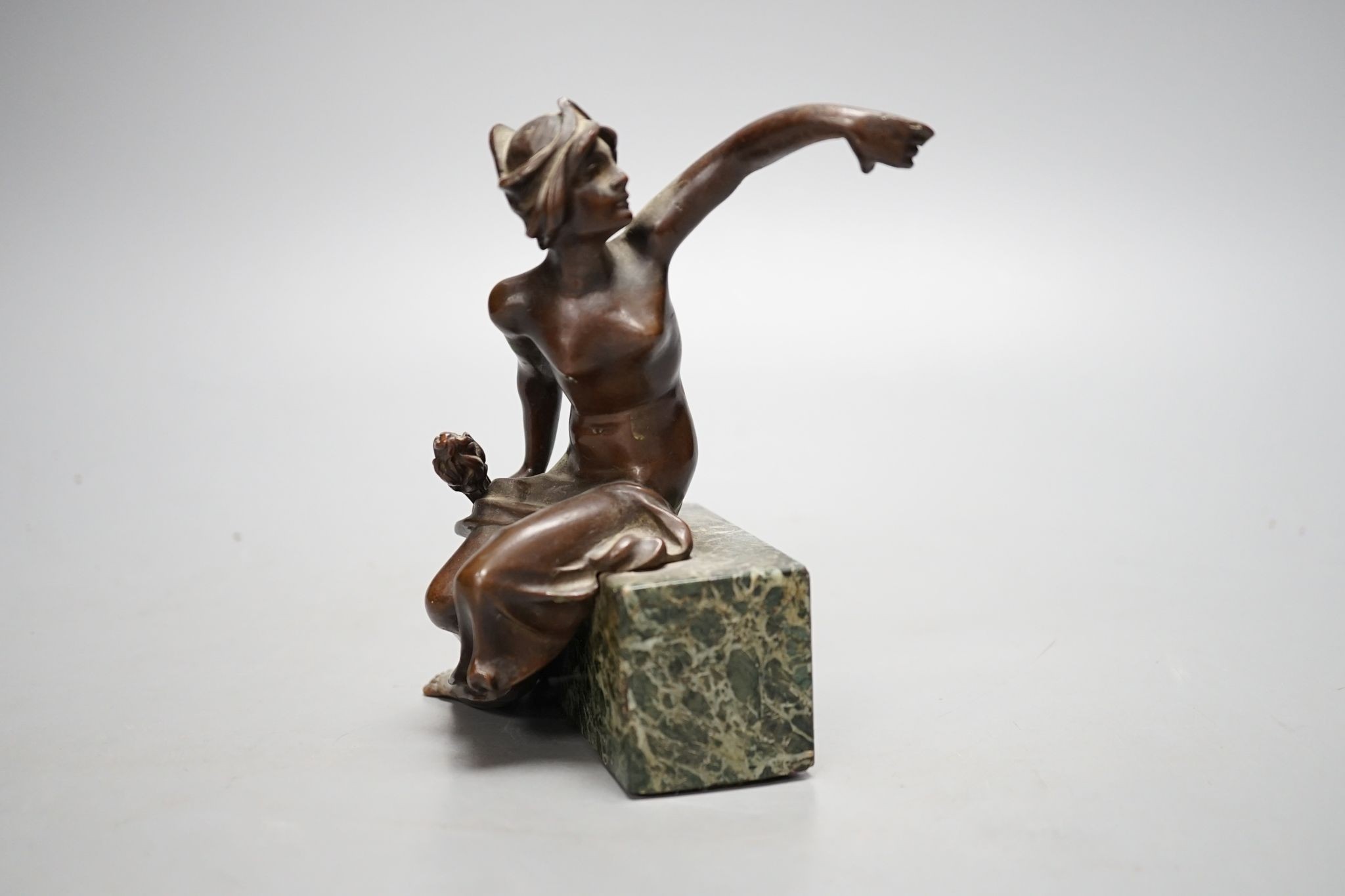 An Art Deco bronze semi-nude seated female, 13 cms high.